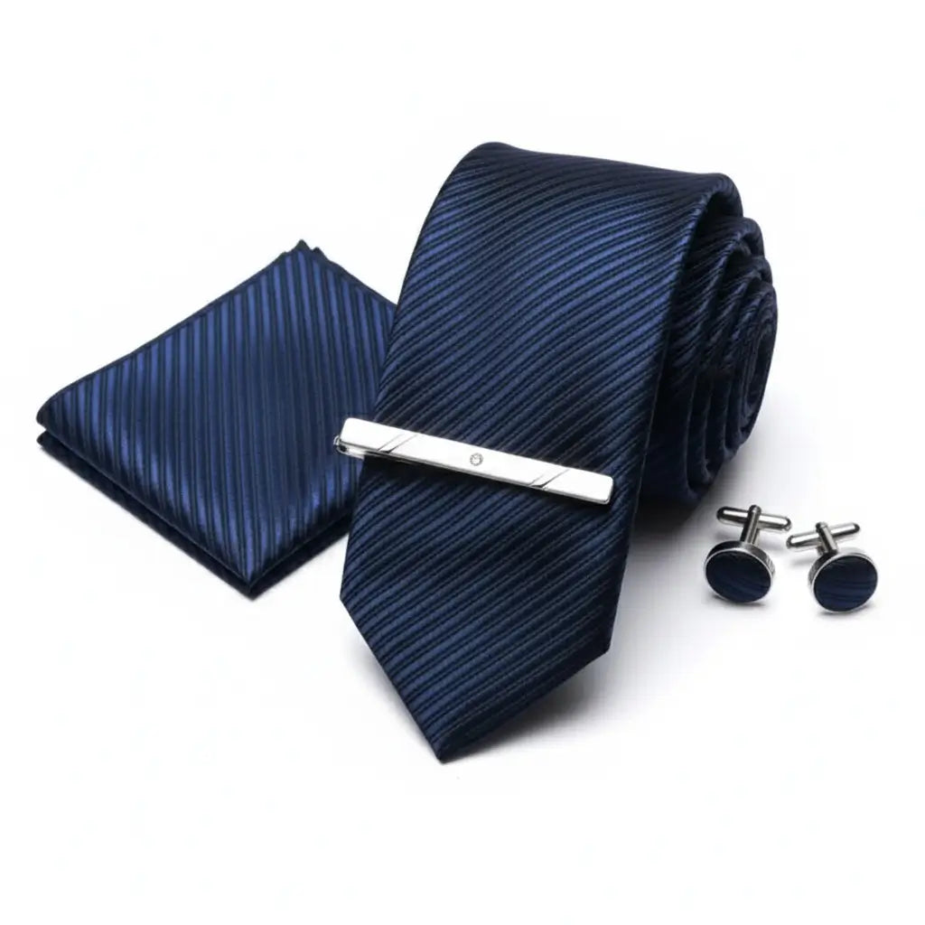 Gravata azul marinho listrada diagonal com lenço de bolso, abotoaduras e prendedor