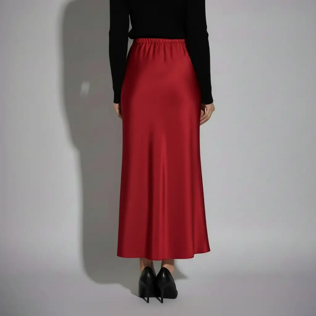 Vista traseira de saia longa em cetim marsala com cós elástico e corte reto, conforto e estilo para o dia a dia feminino