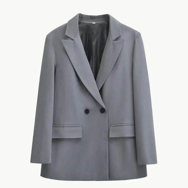 Blazer feminino  AVONNUE usado com calça neutra para visual formal moderno.
