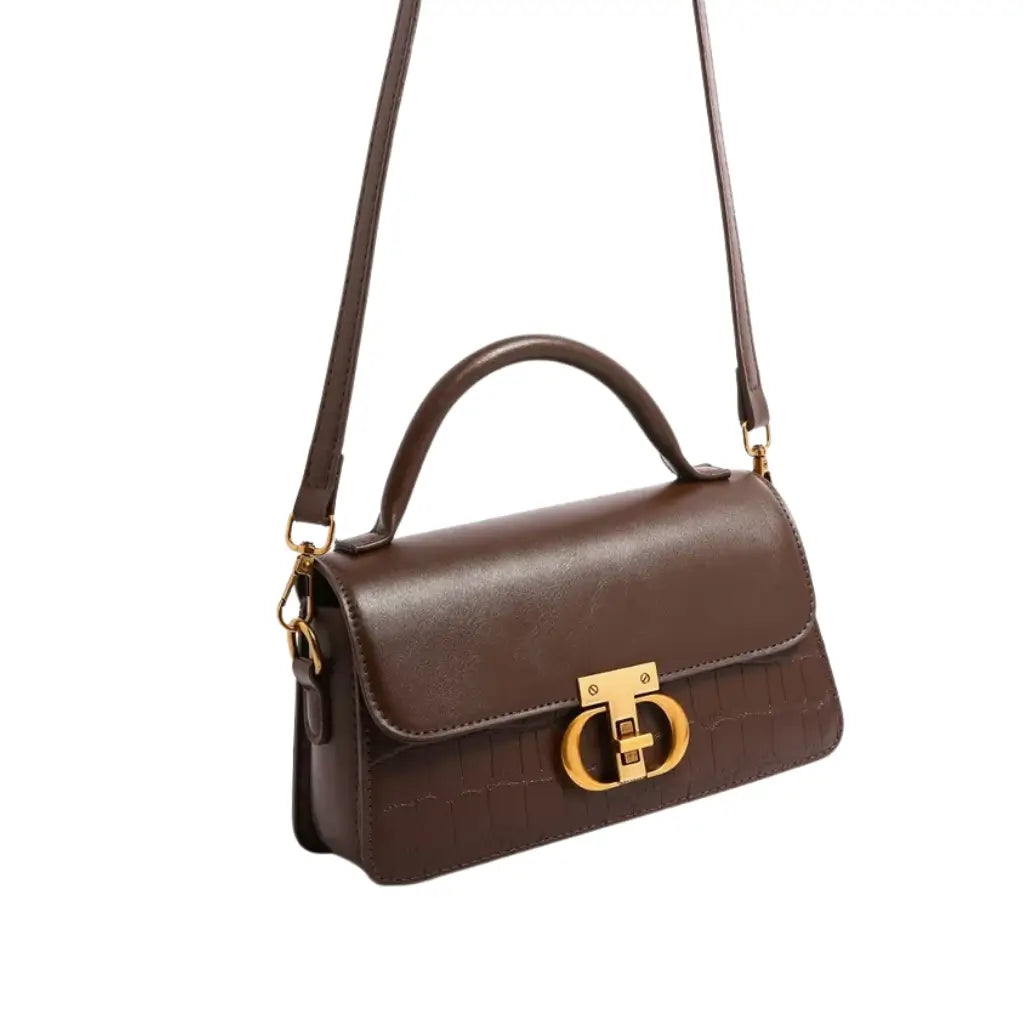 Bolsa feminina marrom estruturada AVONNUE com alça tiracolo e fecho dourado, design elegante e atemporal