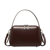 Bolsa feminina marrom estruturada AVONNUE com alça de mão e fecho superior, design sofisticado e minimalista.