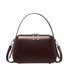 Bolsa feminina marrom estruturada AVONNUE com alça de mão e fecho superior, design sofisticado e minimalista.