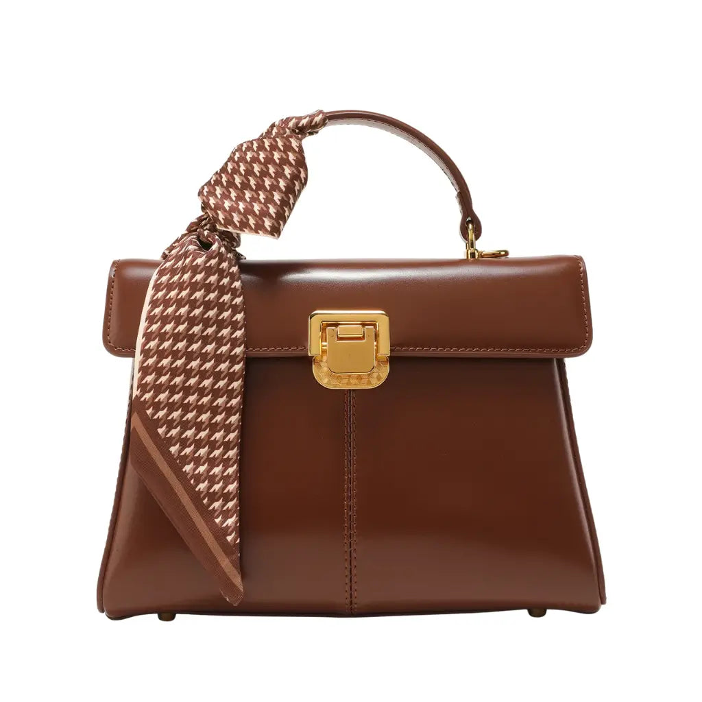 Bolsa feminina marrom estruturada AVONNUE aberta, mostrando interior com divisórias e fecho dourado sofisticado