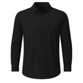 Camisa social masculina manga longa Preta, proporção ajustada em cenário editorial AVONNUE