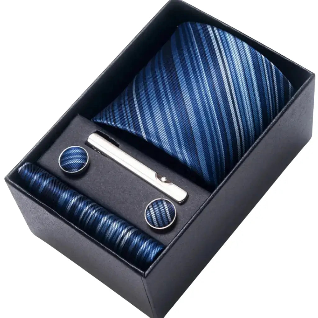 Kit masculino com gravata azul listrada diagonal, lenço de bolso, abotoaduras e prendedor