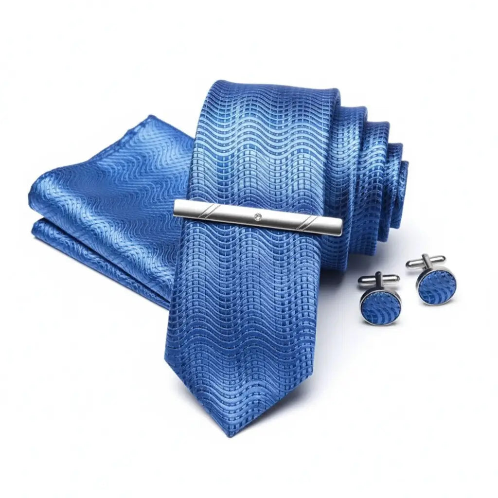 Conjunto com gravata azul ondas, lenço de bolso, abotoaduras e prendedor masculino
