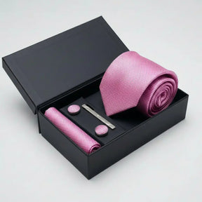 Gravata rosa texturizada com lenço de bolso, abotoaduras e prendedor combinando