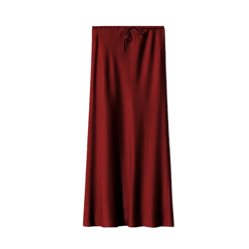 Saia longa marsala feminina de cetim com toque sedoso e brilho discreto, peça atemporal para compor looks versáteis e refinados