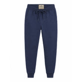 Calça de moletom masculina azul marinho em fundo branco, vista frontal com cordão e punhos